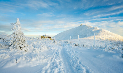 winter landscape of Karkonosze mountains during sunny day in Czech republic 