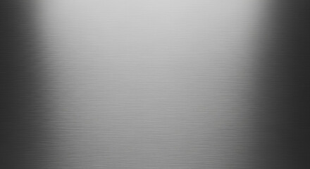 Obraz premium Brushed metal texture background, stainless steel surface with horizontal grain and bright light reflection, industrial backdrop, silver color