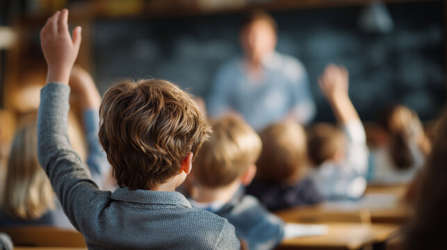 Wide classroom scene, children raising hands while seated at desks, teacher explaining science concept on blackboard, sunlight casting soft shadows, lively learning environment - Powered by Adobe