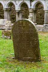 old tombstone the famous ruin of Ross Errily Friary in the north of ireland, county Galway 