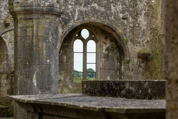 Obraz premium detail view inside the famous ruin of Ross Errily Friary in the north of ireland, county Galway 