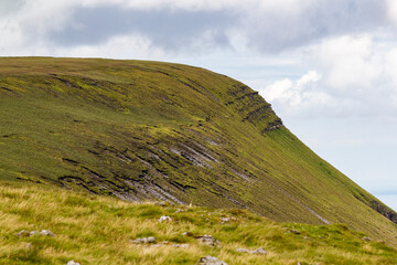 a iconic mountain range view at district sligo in ireland at a cloudy summer day 