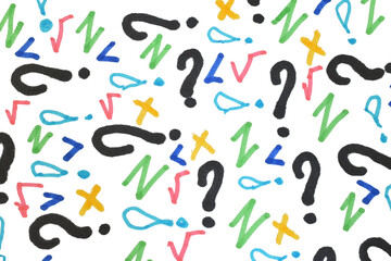 Hand-drawn icons in different colors with markers depicting mathematical and orthographic signs.