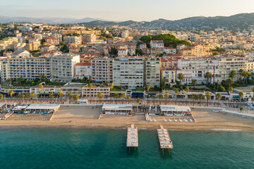 Aerial view of the beautiful beach in Cannes at sunrise, French riviera