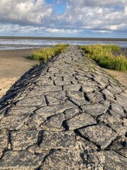 Fototapeta premium Mole am niedersächsischen Wattenmeer der Nordsee in Cuxhaven