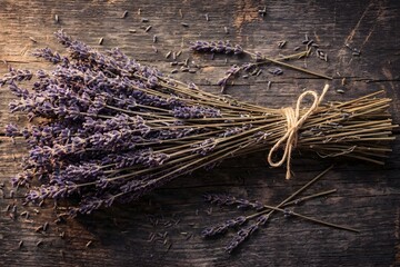 Bunch of Dried Purple Lavender Flowers on Rustic Wooden Table Top View
