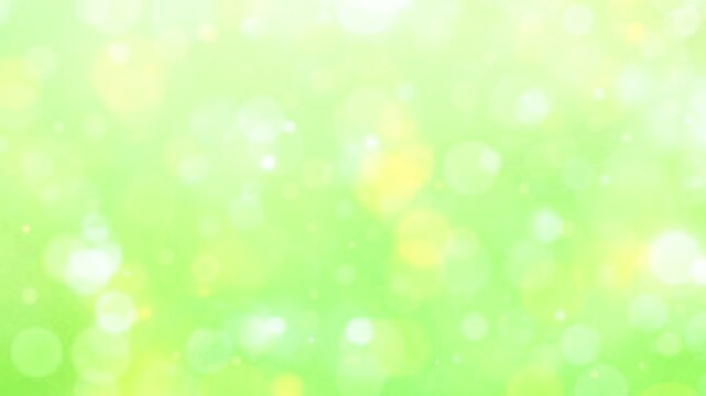 Green and yellow fresh natural bokeh light.Abstract soft glowing light.Spring background.Loop video.      緑と黄色　玉ボケ　ループ動画　爽やか　キラキラ　パーティクル　木漏れ日　パステルカラー　おしゃれ　