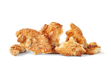 Broken cookies. Pieces of broken cookies isolated on a white