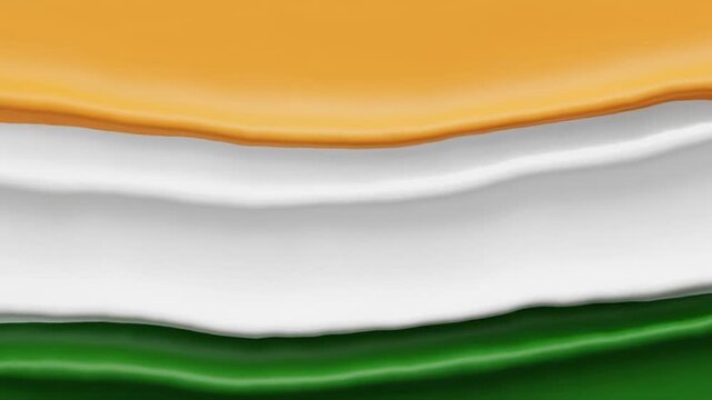 Flowing Indian tricolour animation with saffron, white and green waves blending smoothly.