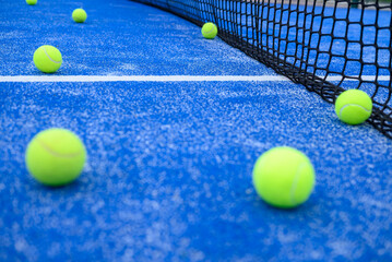 Yellow Sport Balls on Blue Synthetic Grass The Concept of Padel Game