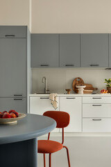 Stylish Minimalist Kitchen with Unique Color Palette and Clean Lines