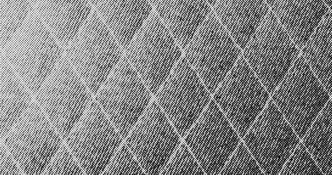 Black and white halftone texture featuring a dynamic diamond grid overlay, creating a modern abstract background.