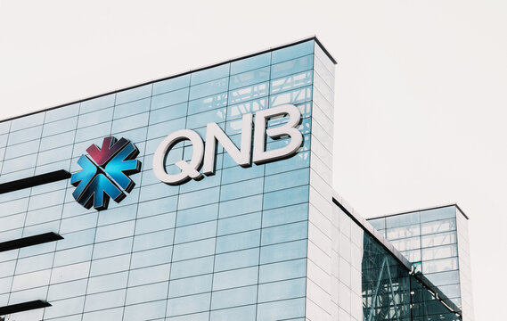 29 November 2025, Doha, Qatar: Modern office building with QNB logo and glass facade, representing banking, finance, and corporate architecture