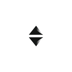 Fototapeta premium Geometric shapes forming a symmetrical logo design on a simple background from a front view