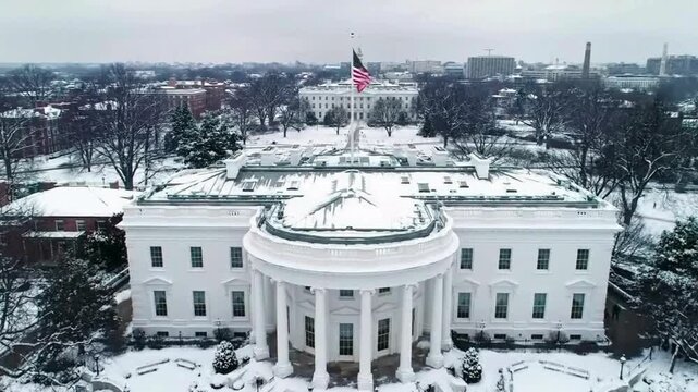 Aerial Top-down of White House, Washington DC. cover by snow in winter