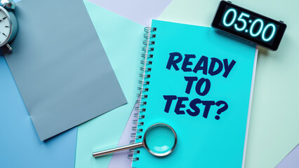 Ready to test notebook with magnifying glass and clock showing five oclock creates focused study atmosphere