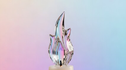 Abstract glass flame sculpture against a soft gradient background