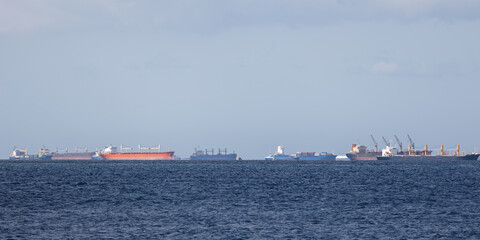 Many cargo ships at anchor in Marmara sea on sunny day, Istanbul, Türkiye
