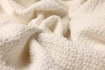 Texture of clean beige fabric as background, closeup
