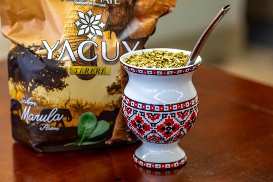 Brazil, January 17, 2026. Traditional yerba mate terer&eacute; with Amarula flavor served in a Ukrainian porcelain gourd.