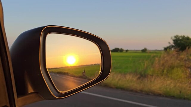 Beautiful Sunset Reflection in Car Side Mirror at Rural.