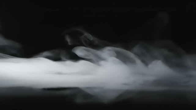 White Smoke Puffs on Black Background.