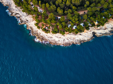 Coastal resort aerial drone top down panorama with turquoise sea view in Pula Croatia.
