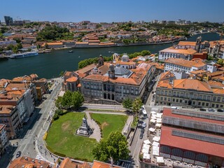 Naklejka premium Aerial view of Bolsa Palace and old town of Porto, Portugal. The Stock Exchange Palace (Portuguese: Palácio da Bolsa) is a historical building in Porto, Portugal. 