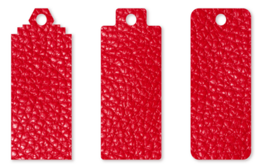Three blank red tags of different shapes with genuine leather texture are arranged in a row