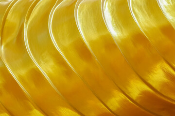 wavy gold texture for background and design.