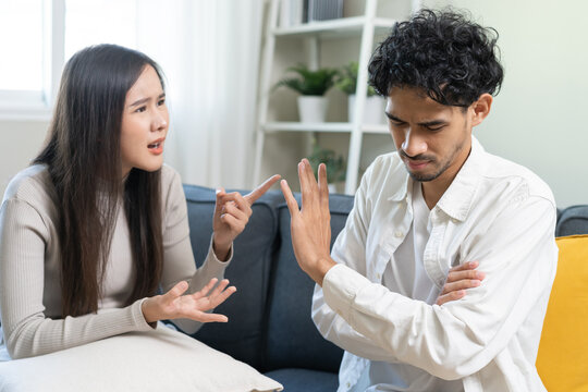 Breakup and depressed, asian young quarrel couple love fight relationship in trouble. Different people are emotion angry. Argue husband has expression upset with wife. Problem of family people.