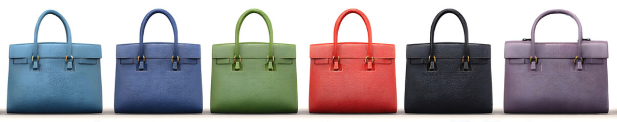 Assortment of colorful leather handbags in a row purse white background