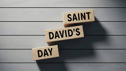 St david's day celebration wooden blocks on gray background