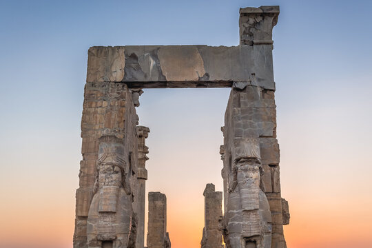 Sunset over Gate of All Nations in ruins of Persepolis ancient city, Iran