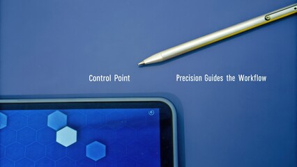 Metallic Stylus Hovering Above Tablet Screen