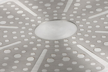 Stainless steel induction cookware bottom texture background