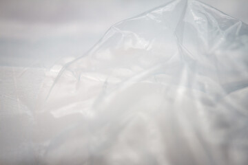 Extreme macro of plastic bubble wrap texture. Selective soft focus, shallow depth of field. Abstract dreamy background