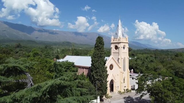 White facade of the San Francisco Javier parish in front of the main square under sunlight in San Javier and Yacanto Traslasierra Cordoba.