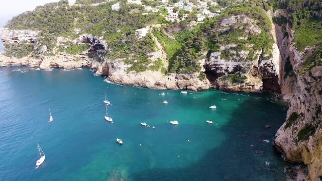 Aerial view of the anchorage and cliffs in Black Cape, in the Mediterranean village of Javea, Spain. 