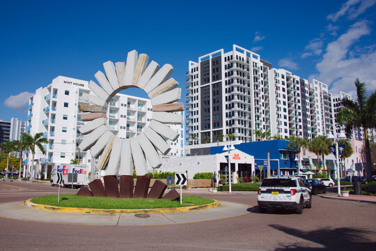 Edge District roundabout The Sun on the EDGE sculpture on Central Avenue  at 11th Street inEditorial Use Only Jan 15, 2026 St. Petersburg, FL USA.  Police Car in the road.