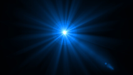 A vibrant blue light burst with a captivating optical lens flare effect and bright starburst glow isolated on black background