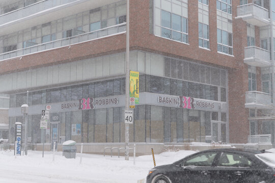 future location of a Baskin‑Robbins at 1820 Bloor St W during a snow storm on 2026-01-15 in Toronto