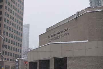 Obraz premium exterior building and sign of Westin Harbour Castle Conference Centre located at 11 Bay St, Toronto - winter