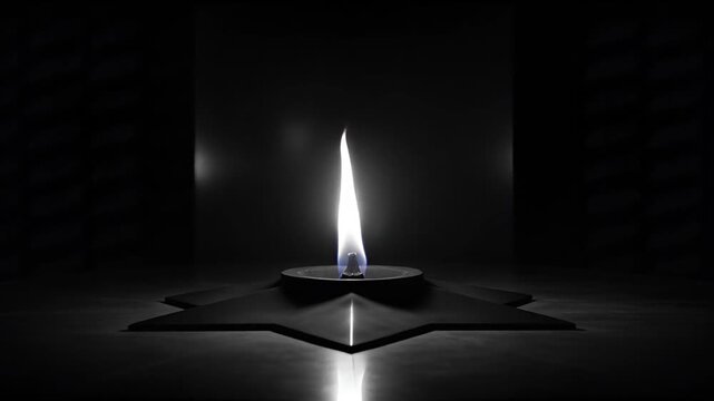 A Lit Candle on Black Background