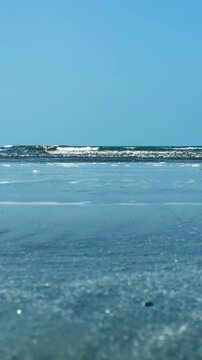 Vast expanse of frozen water surface vertical video