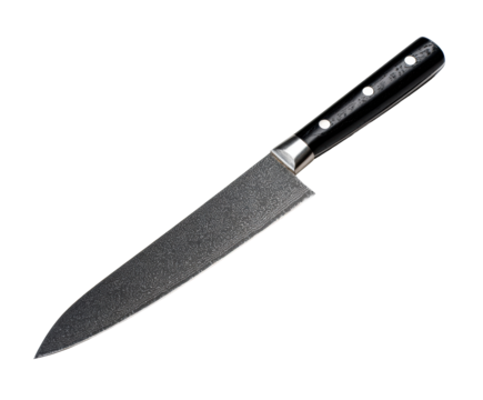Professional chef's knife with a Damascus steel blade featuring a distinct wavy pattern and a classic black composite handle with three steel rivets - Powered by Adobe