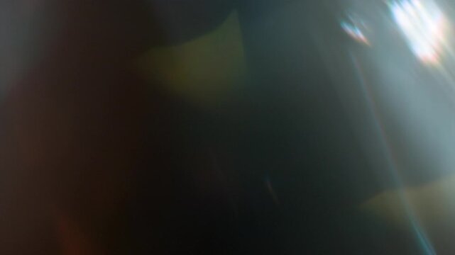 Real Shooted Cinematic Lens Flare Overlay on Black Background at 1000fps Slow Motion.