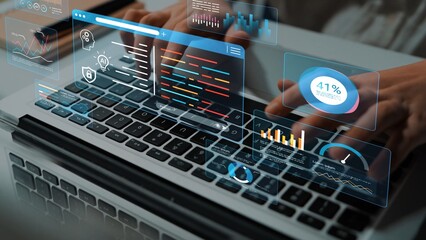 Modern Technology and Data Analysis Concept with Virtual Interface Over Laptop Keyboard for Business and Finance Research Applications Gluon.