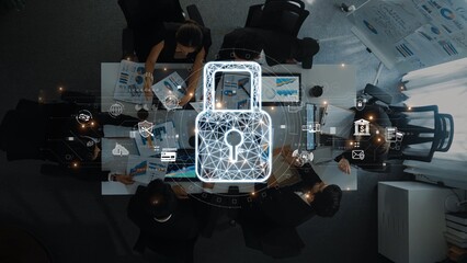 A modern office scene illustrating digital security collaboration with a lock symbol, emphasizing data safety, teamwork, and effective cybersecurity strategies for businesses. Raster
