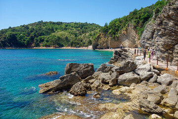 Budva, Montenegro - 04.30.2025: beautiful Mogren beach in riviera coastline